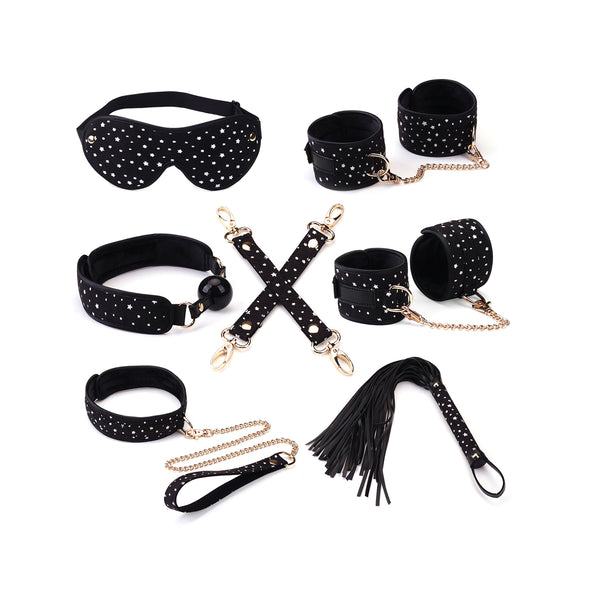 Starry Nights Beginner's Bondage Kit with black and gold flogger, wrist and ankle restraints, collar, blindfold, hogtie, and ballgag for BDSM play