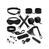 Complete beginner's bondage kit with black lace design including wrist and ankle restraints, collar, blindfold, hogtie, flogger, shibari rope, nipple clamps, ball gag, butt plug, and bullet vibrator.