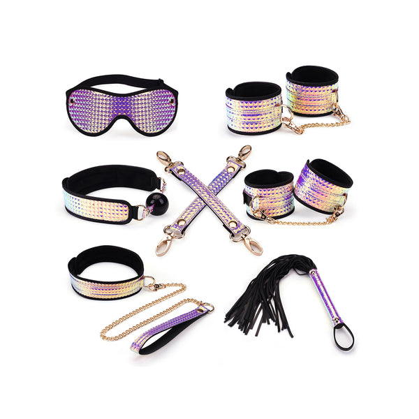 Vivid Murasaki Glossy Purple Soft Bondage Kit with seven pieces including flogger, ballgag, hogtie, wrist and ankle cuffs, collar with leash, and blindfold in glossy purple