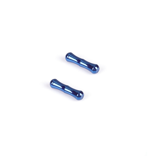 Blue magnetic nipple clamps for BDSM play on a white background