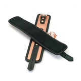 Rose gold leather hogtie and restraints set with black velvet padding and quick-release clips for safe, adjustable bondage play