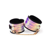 Glossy purple holographic ankle cuffs with gold chain from Vivid Murasaki Soft Bondage Kit