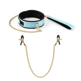 Glossy blue bondage collar with rose gold chain leash and nipple clamps, part of a beginner's bondage kit for BDSM exploration