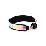 Holographic purple ballgag with soft black strap and rose gold hardware from the Vivid Murasaki Glossy Purple Soft Bondage Kit