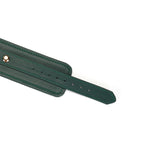 Mossy Chic leather wrist cuffs with gold hardware and adjustable holes for bondage play