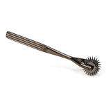 Stainless Steel Three-Row Wartenberg Pinwheel for BDSM sensory play, featuring sharp spike rows and grooved handle