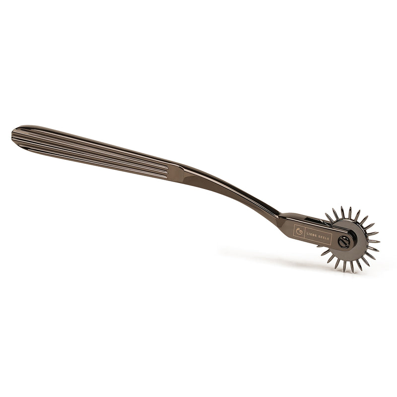 Stainless steel X-Rose single-row Wartenberg Pinwheel for sensory BDSM play, featuring ribbed handle and sharp wheel