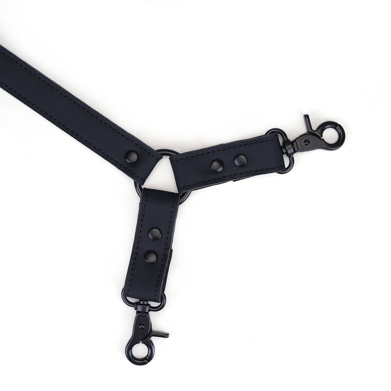 Vegan leather wrist-to-collar restraint with adjustable buckles and quick-release clips for safe and secure bondage play