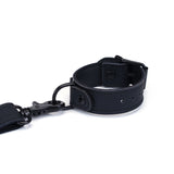Black vegan leather wrist-to-collar restraint with adjustable buckle and quick-release metal clip for BDSM
