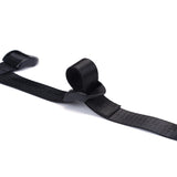 Black vegan leather strap-on harness with adjustable straps and velcro, suitable for pegging and strap-on play