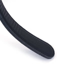 Close-up of a black vegan leather paddle emphasizing texture and quality, part of the Vegan Fetish collection.