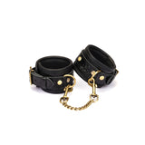 Crocodile Noir: Black Leather Wrist Cuffs with Bronze Hardware