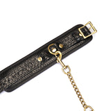 Crocodile Noir: Black Leather Ankle Cuffs with Bronze Hardware