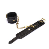 Crocodile Noir: Black Leather Ankle Cuffs with Bronze Hardware