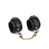 Crocodile Noir: Black Leather Ankle Cuffs with Bronze Hardware