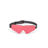Red Italian leather blindfold with adjustable black buckle strap, designed for fashion-forward sensory play
