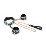 Italian leather wrist to collar set in green, featuring adjustable handcuffs and collar connected by a stylish chain, ideal for enhancing fashion-focused bondage attire.
