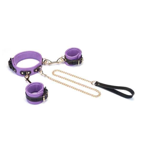 Italian leather wrist to collar set in purple with gold chain and black handle, ideal for fashion-forward bondage enthusiasts
