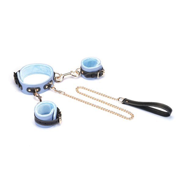 Italian leather wrist to collar set in light blue with gold chain and black handle, stylish bondage accessory on white background