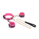 Rose red Italian leather wrist to collar set with connecting gold-tone chain and black handle, adjustable and stylish for bondage fashion