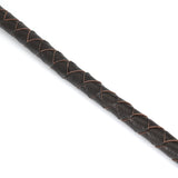 Close-up view of the luxurious hand-braided leather bullwhip from the Wild Gent collection, designed for BDSM impact play