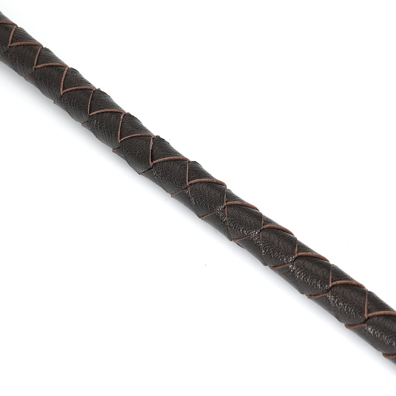 Close-up view of the luxurious hand-braided leather bullwhip from the Wild Gent collection, designed for BDSM impact play