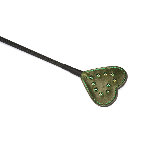 Luxury green leather riding crop with gemstone details and black handle, ideal for BDSM and erotic experimentation