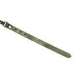 Close-up view of a luxury green leather strap with gemstone embellishments for bondage gear