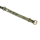 Luxury green leather ball gag strap with gemstone embellishments and gold-tone metal buckle