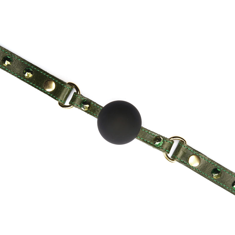 Luxury green leather ball gag with gemstone detailing and adjustable metal buckles for erotic experiments