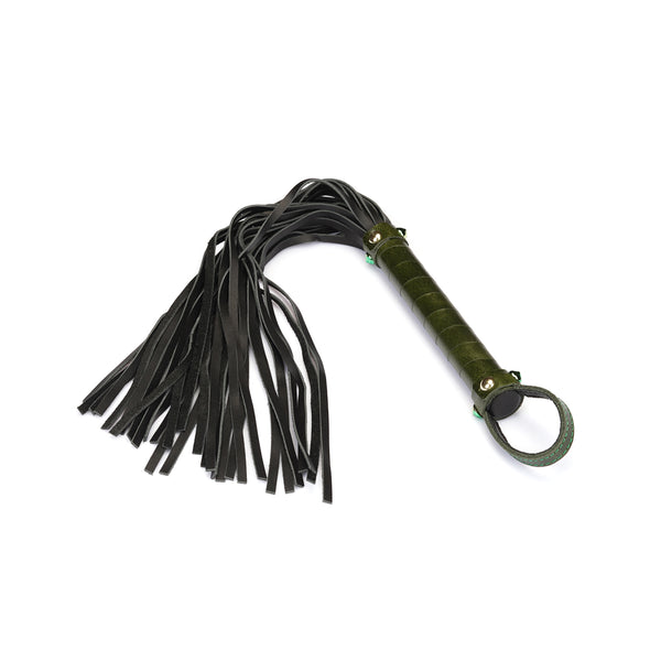Luxury green leather flogger with gemstone embellishments and black tails