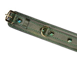 Close-up of luxury green leather wrist cuff with gemstones and metal buckle from LIEBE SEELE