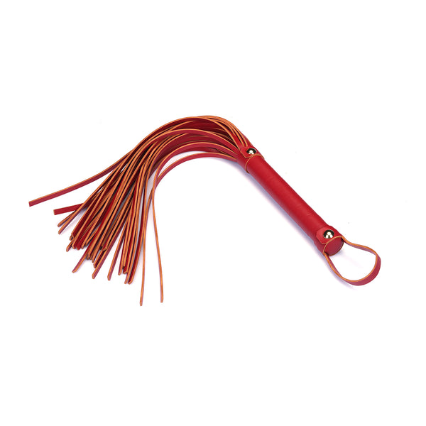 Red faux leather flogger with elongated strands and loop on handle for BDSM play, promoting passion and energy