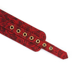 Luxury red rosy lamb suede leather ankle cuff with floral pattern and adjustable metal grommets, part of the Kinbaku Ukiyoe series
