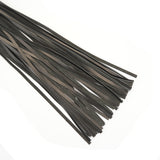 Close-up of Kinbaku Ukiyo-e luxury red rosy lamb suede leather flogger strands