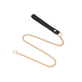 Shining Girl black leather collar with attached golden chain leash, highlighting elegant craftsmanship and design for bondage gear