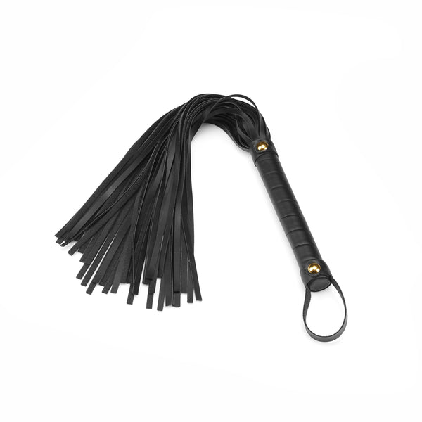 Black vegan leather flogger whip from the Dark Candy collection, featuring a textured handle and multiple supple strands for BDSM play