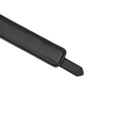 Close-up of black leather strap with detailed stitching, part of premium leather thigh cuffs from the Dark Secret collection