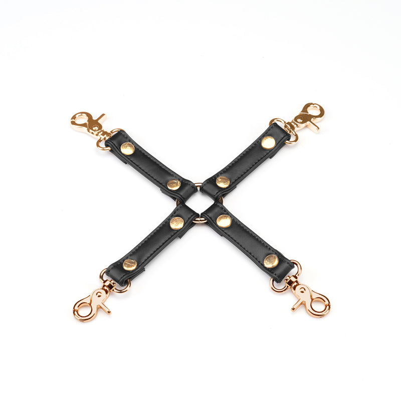 Black vegan leather bondage hogtie with golden hardware from Dark Candy collection