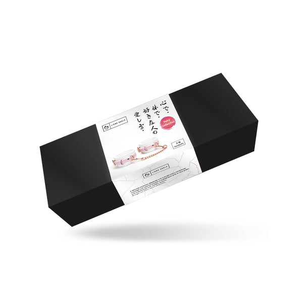 Luxurious black and white product packaging box with a detailed label showing a tea set, Japanese text, and essential product information, emphasizing a sophisticated and international branding approach