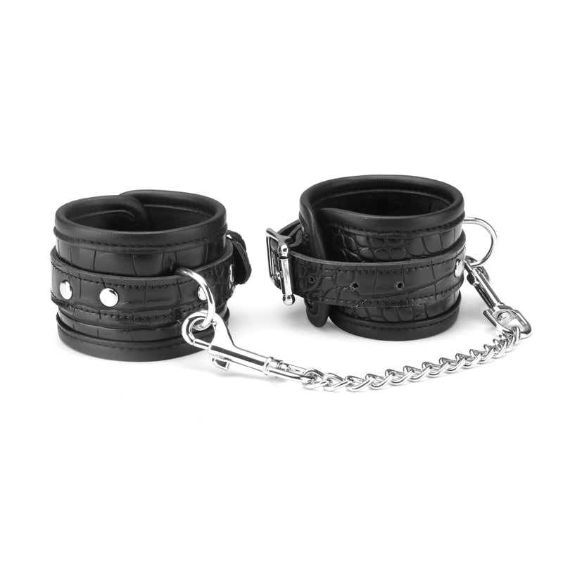 Faux crocodile leather wrist cuffs with plush lining and metallic chain for bondage play