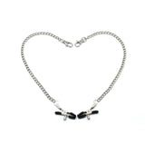 Silver metal chain and bull nose nipple clamps with black rubber tips from LIEBE SEELE, designed for adjustable pinch intensity in bondage play