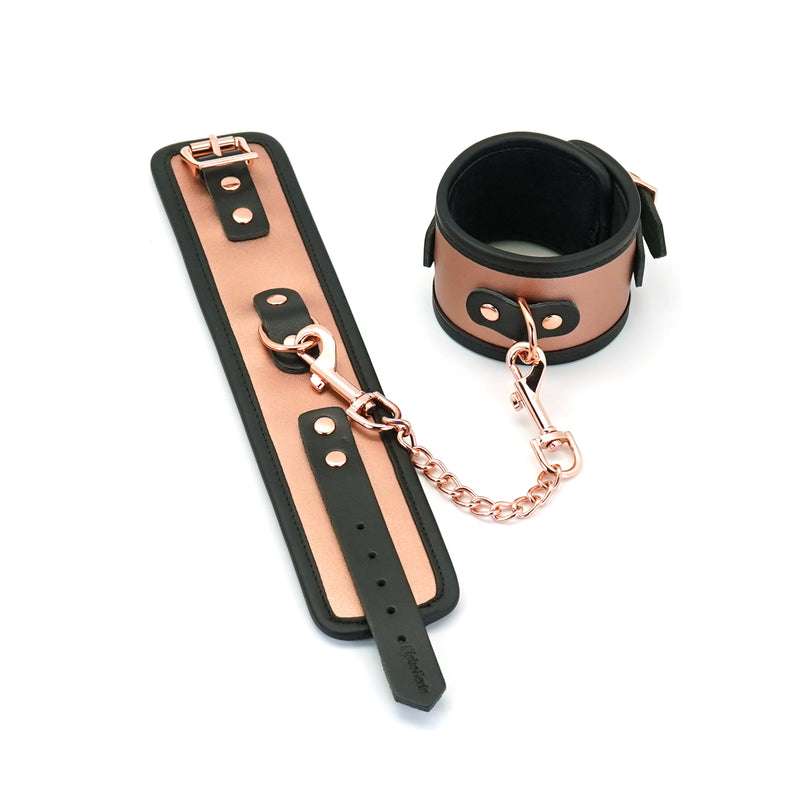Rose gold leather ankle cuffs with black faux fur lining, featuring adjustable straps and detachable metal chain for BDSM play