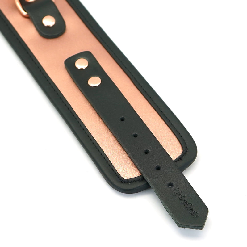 Rose gold leather ankle cuffs with faux fur lining and adjustable holes for BDSM restraint play, from Liebe Seele's Rose Gold Memory collection