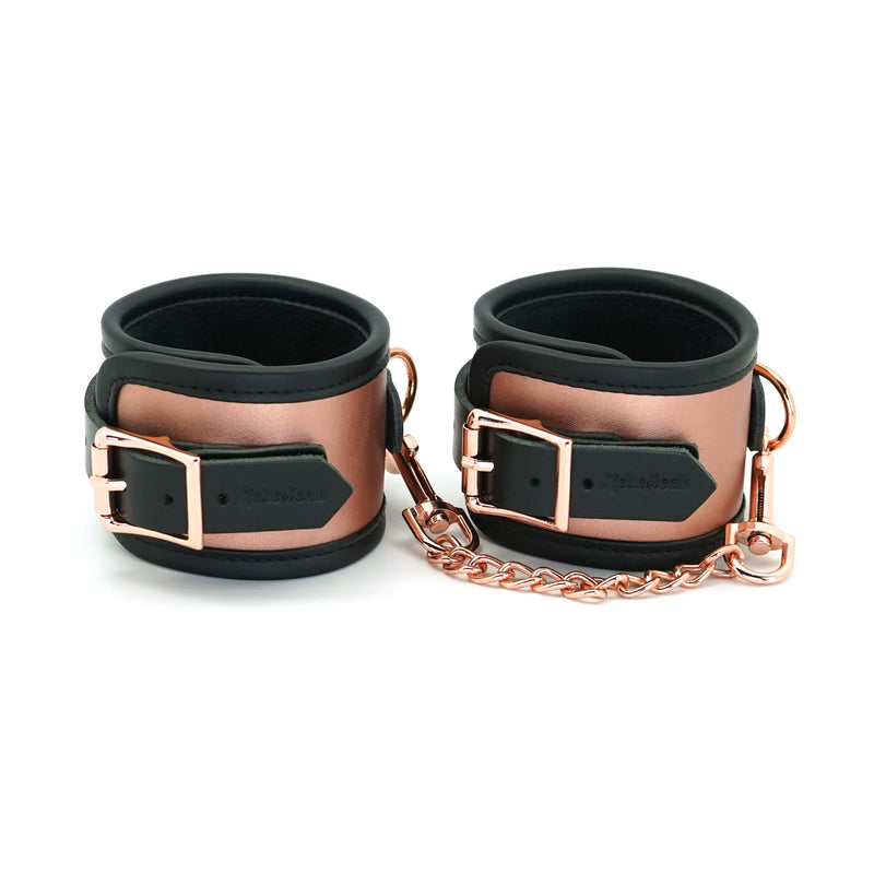 Rose Gold Leather Ankle Cuffs with Faux Fur Lining for BDSM play, featuring adjustable straps and quick-release clips