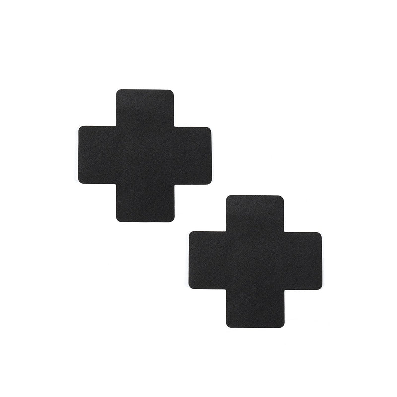 Black cross-shaped nipple pasties from the Bound You beginner's bondage kit.