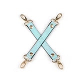 Blue holographic hogtie with gold clasps from the Vivid Sorairo soft bondage kit.