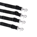 Under Mattress Restraint System featuring adjustable black webbing straps with silver clips and buckles for bondage play
