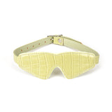 Electric yellow faux crocodile leather blindfold with adjustable buckle, part of a Macaron beginner's bondage kit