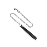 Black Bond leather collar with chain leash showcasing soft lining and silver metal detailing from sustainable BDSM collection.